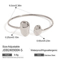 Gold-Plated Stainless Steel Cuff Bracelet with Teardrop Open Profile Detail — additional design view — jewelry finish and design detail