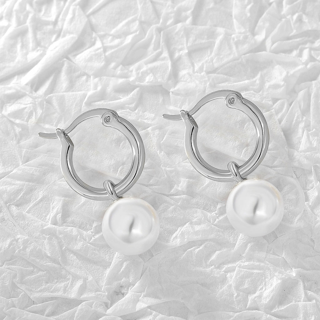 Gold-Plated Brass Shell Pearl Hoop Earrings with Minimalist Detail in a gold-tone brass finish