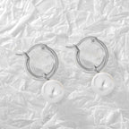 Gold-Plated Brass Shell Pearl Hoop Earrings with Minimalist Detail in a gold-tone brass finish