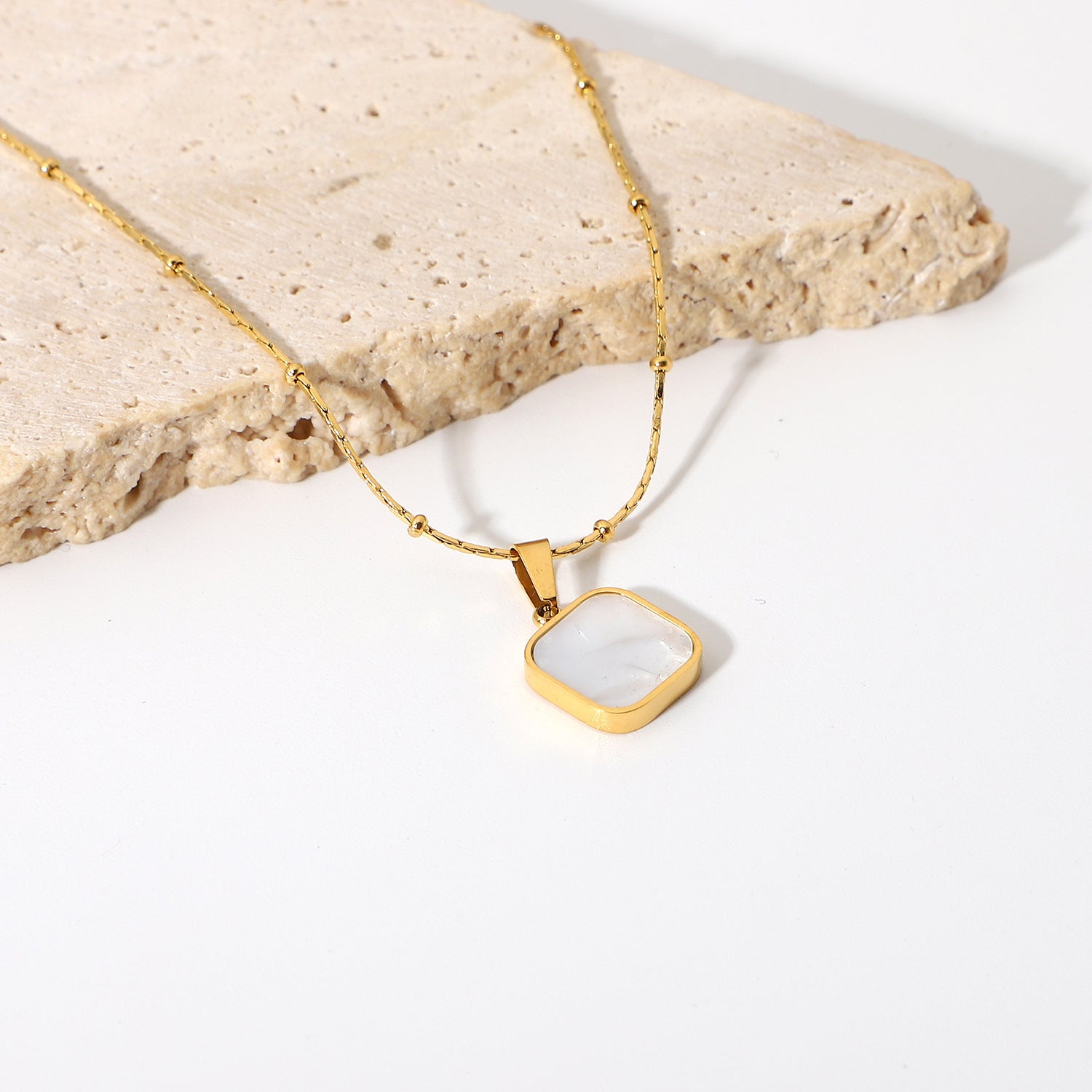 Gold-Plated Brass Shell Necklace in a gold-tone brass finish