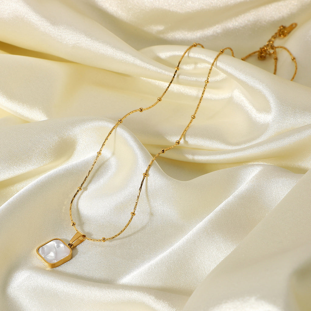 Gold-Plated Brass Shell Necklace for private-label fashion jewelry buyers