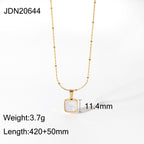 Gold-Plated Brass Shell Necklace styled for independent jewelry boutiques