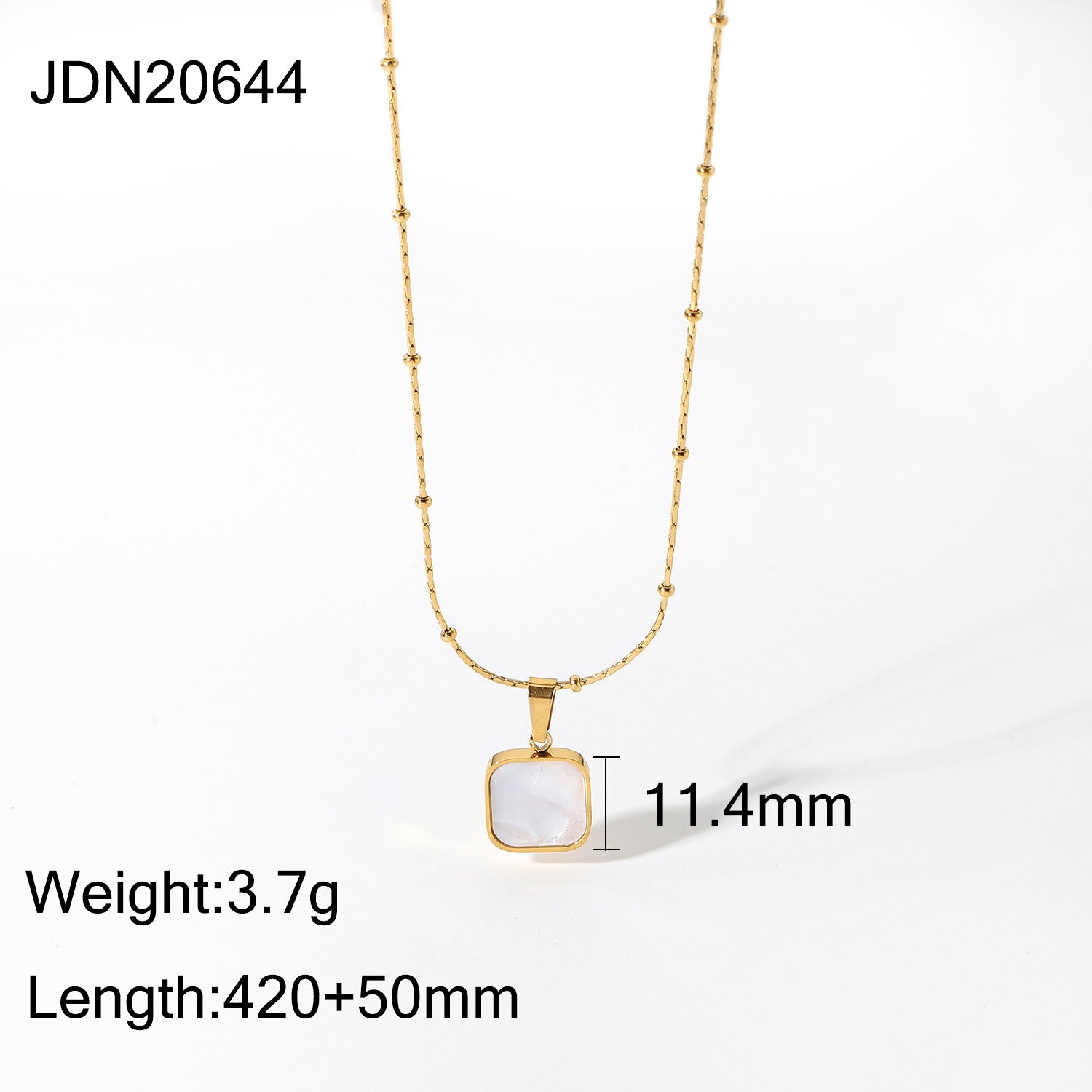 Gold-Plated Brass Shell Necklace styled for independent jewelry boutiques