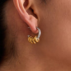 Stainless Steel Earrings in Gold-Tone — Polished Silhouette in a gold-tone stainless steel finish