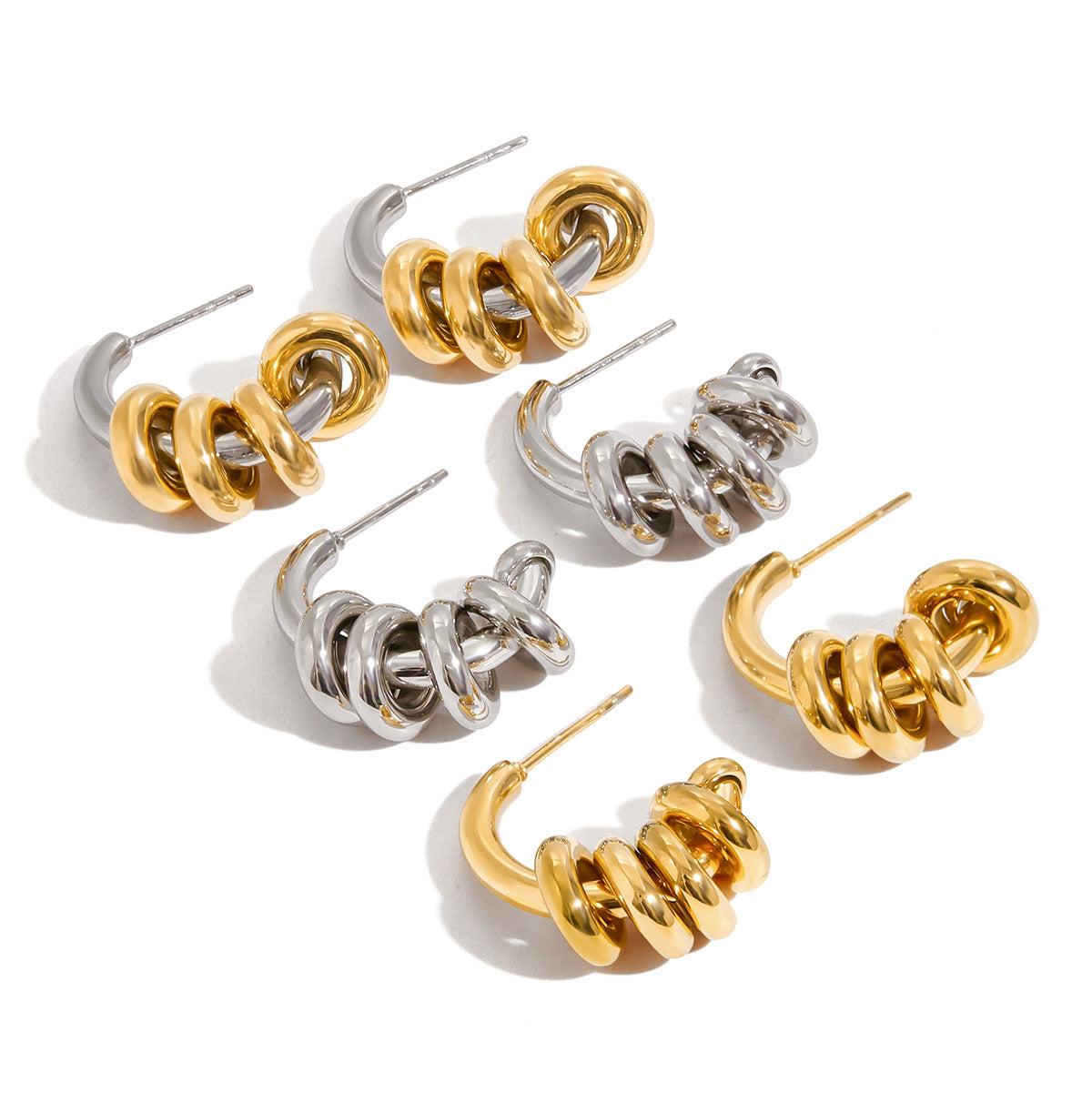 Stainless Steel Earrings in Gold-Tone — Polished Silhouette with gold-tone stainless steel construction