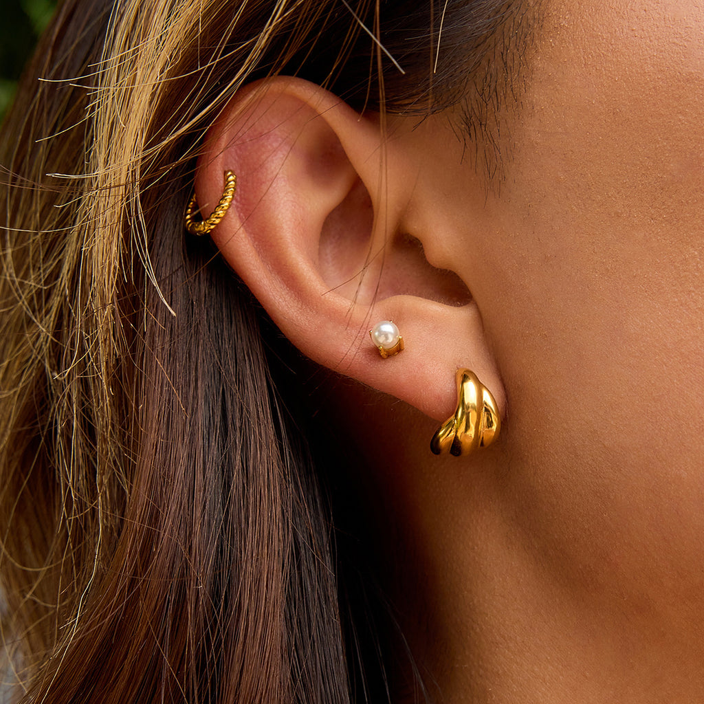 Gold-Tone Stainless Steel Pearl Hoop Earrings with pearl design details