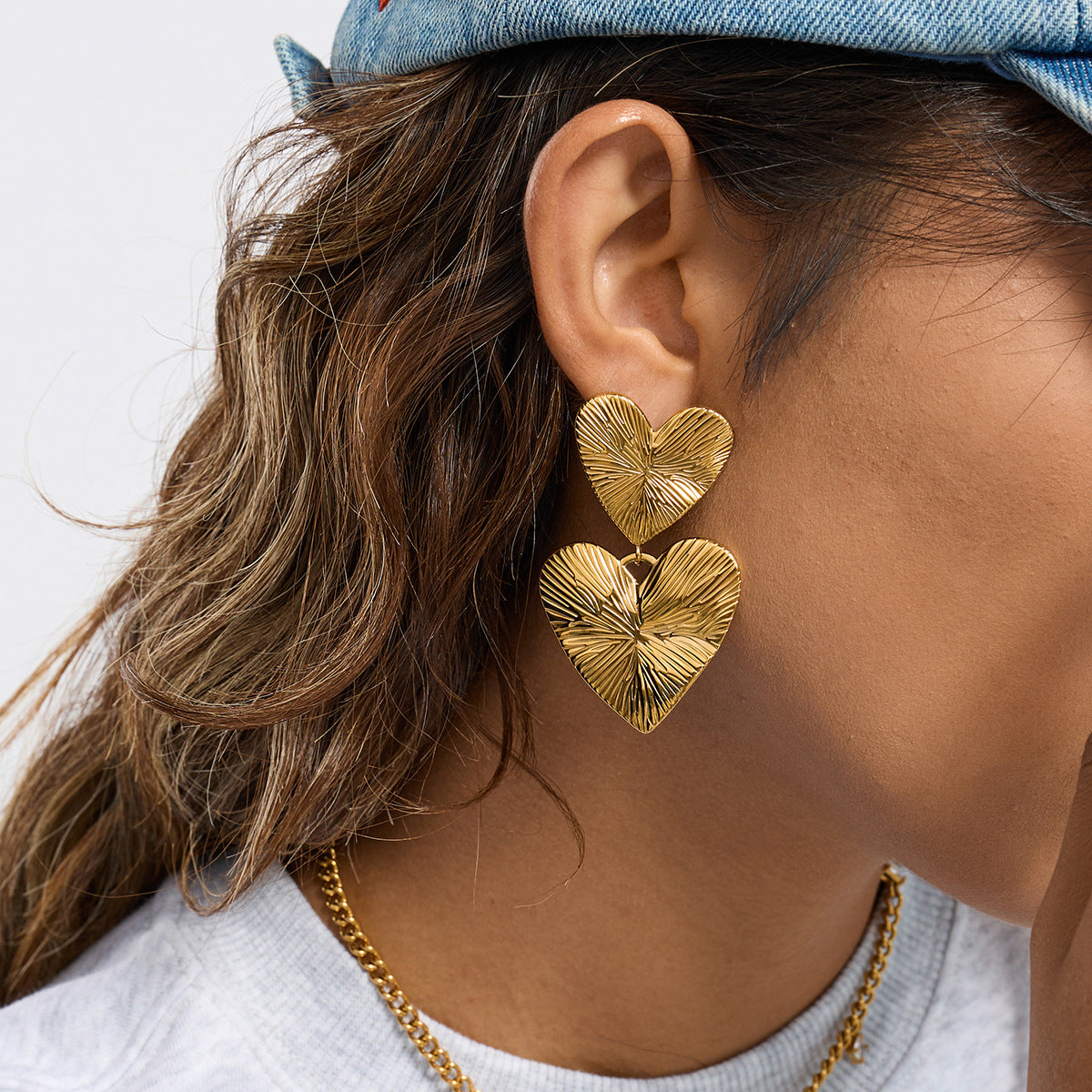 Heart Sculptural Gold-Tone Stainless Steel Earrings with heart design details