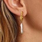 Gold-Tone Stainless Steel Pearl Stud Earrings — Thoughtful Design in a gold-tone stainless steel finish
